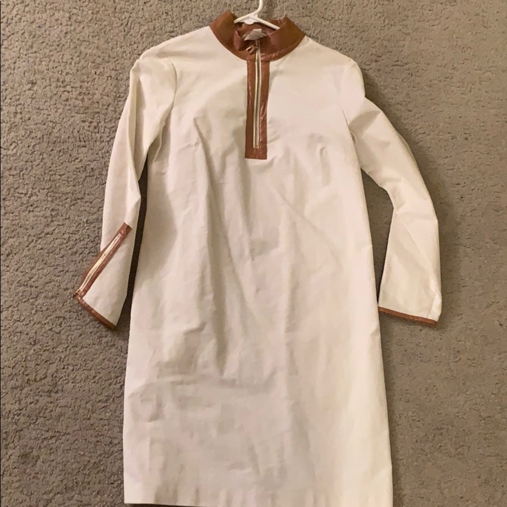 White beachy fancy dress with leather detail